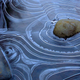 Illustration for article titled What Caused These Rings of Ice to Form Around Rocks?